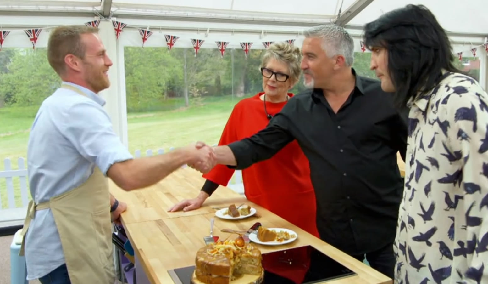 Handshake moment with Steven Carter-Bailey